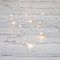 Гирлянда светодиодная "Жемчужинки" 1.5м 10LED тепл. бел. провод прозр. 2хAA (батарейки не в комплекте) | код 303-097 | Neon-Night